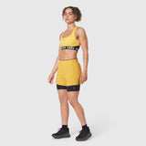 W087 Aerotex Side Split Liner Short in amber, worn with matching sports bra