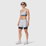 W087 Aerotex Side Split Liner Short in Sedona Snow Camo, worn by model, front view