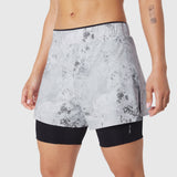 W087 Aerotex Side Split Liner Short in Sedona Snow Camo, worn by model, back view