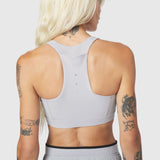 W096 LYCRA® ADAPTIV Racerback Sports Bra in Slate Grey, back view on model