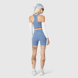 W097 LYCRA® ADAPTIV Seamless Zip Bra in Slate Blue, back view on model
