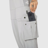 W100 2-in-1 Convertible Pant in Slate Grey, worn with phone in cargo pocket